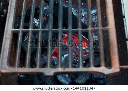 Flaming Coal in the grill. Burning coal
