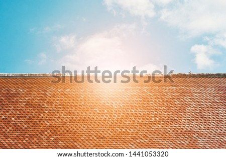 Tile Roof pattern background with color tone sunlight.