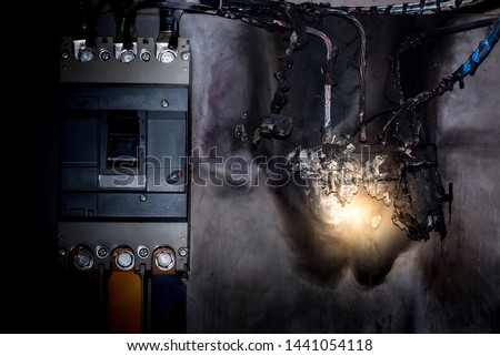 Overloaded circuitry causes the fuse to break, short circuit fault, burn consumer unit, short circuit Royalty-Free Stock Photo #1441054118