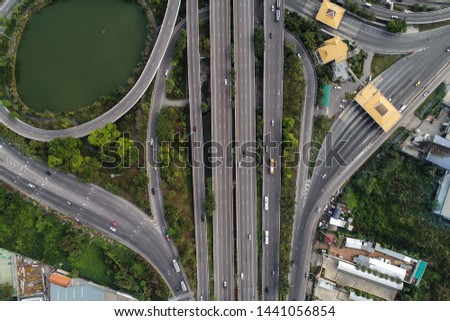 Aerial view intersection coty cross road with vehicle