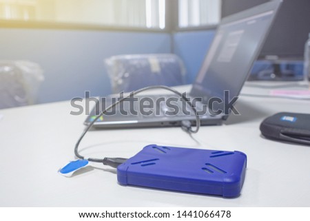 portable hard drive connected to a laptop 