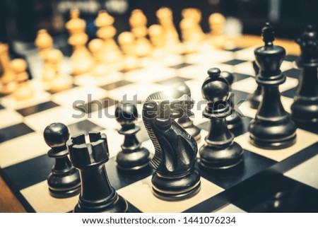 Background of chess game set with King, queen, pawn, knight, house pieces represent business completion thinking  strategy plan to successful win future innovation transformation with leadership