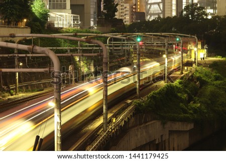 Long exposure with light trails Royalty-Free Stock Photo #1441179425