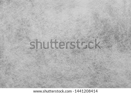Brushed metal texture. Polished metal texture background with light reflection.
