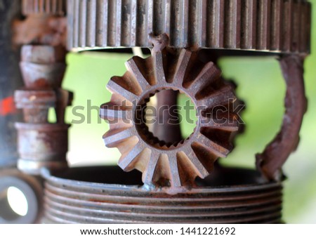 Metal art in the style of steampunk, close-up, gears, pistons, bushings
