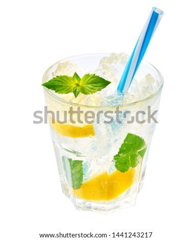 Lemonade in a glasses on a white background, isolated. Cold refreshing lemonade for summer party and fun.