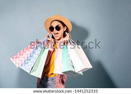 shopping Asian girl smile so happy sale Manny bag and background 