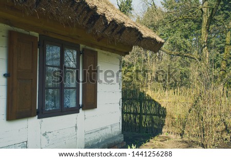 Window in an old wooden house   