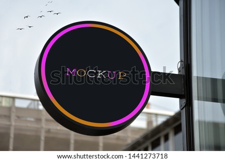 Colorful hollow signboard hanging on the street wall, mockup signboard, 3d render, made ready for your design.
