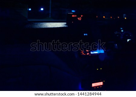 looking from inside taxi on the nightlight