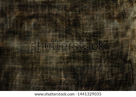 Dark wood scratched background, close up