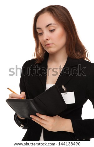 Businesswoman writting on notebook isolated on white