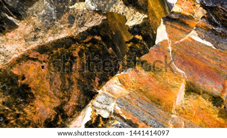 Colorful abstract background. Macro texture of stones. Rock.Terracotta, orange.  Modern poster, print, web design. Creative and unusual backdrop.Amber Image.