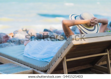 Portrait beautiful young asian woman happy smile relax around neary beach and sea for leisure travel and vaction