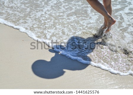 girl on the beach of the Caribbean sea in Martinique