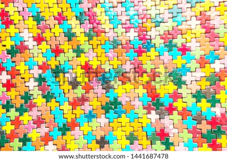 Multicolored plus shaped of ceramic wall tile decorated as the abstract material background and textured