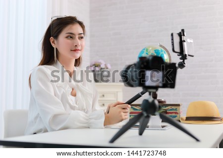 woman present  product  sale online a live vdo to social network by internet concept  blogger Royalty-Free Stock Photo #1441723748