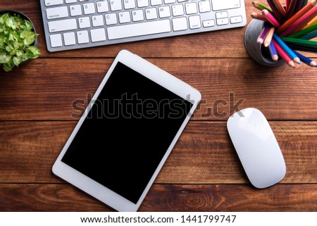 Desk workspace . Business Objects in the office on wooden table background