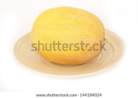 Ripe fresh honeydew melon. Whole melon and slices. Isolated on white background. Studio shooting high quality photo.