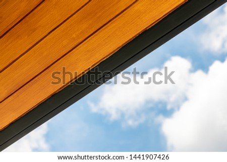 Wood ceiling panels for roof and blue sky