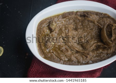 Stock photo of Harees,a dish of boiled, cracked, or coarsely-ground wheat, mixed with meat. Its consistency varies between a porridge and a dumpling. Harees is a popular dish known in the Arab states