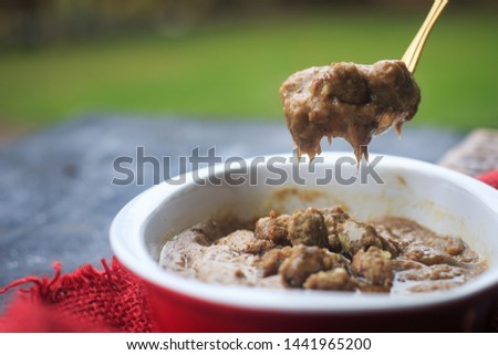 Stock photo of Harees,a dish of boiled, cracked, or coarsely-ground wheat, mixed with meat. Its consistency varies between a porridge and a dumpling. Harees is a popular dish known in the Arab states