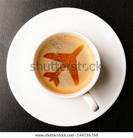 airport coffee cup. fresh espresso on table, view from above Royalty-Free Stock Photo #144196768
