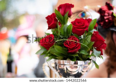 Beautiful red roses centerpiece at horse race 