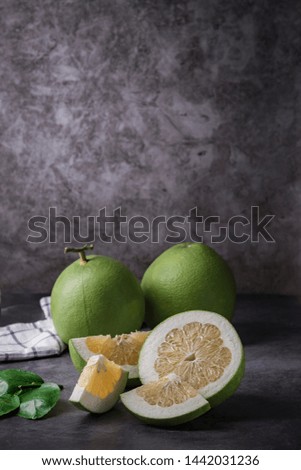 Pomelo Fruit on dark Background.