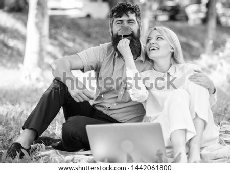 Couple in love or family work freelance. Modern online business. How to balance freelance and family life. Family spend leisure outdoors work laptop. Stories of enduring family success and innovation.