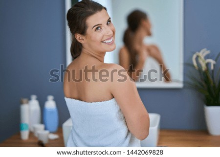 Picture of adult brunette woman in the bathroom