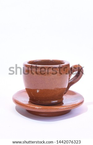 pottery cup on white background