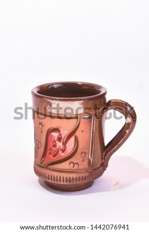 pottery cup on white background