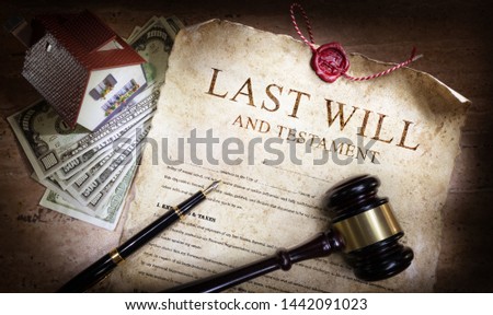 Last Will And Testament With Money And Planning Of  Inheritance 
 Royalty-Free Stock Photo #1442091023