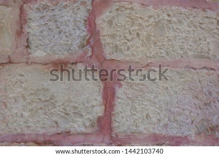 Brick wall, masonry, old abstract texture. Pink background.  Royalty-Free Stock Photo #1442103740
