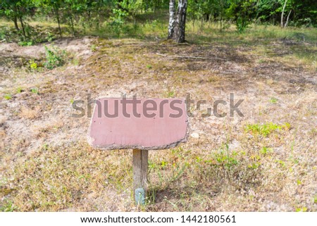 an empty blank signboard in the nature