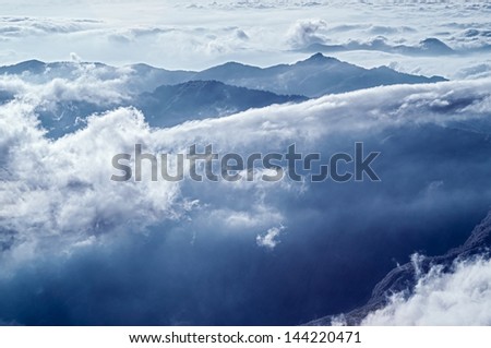 Dramatic cloudy mountain scenery of famous Alishan Range, infrared photography in Taiwan, Asia.