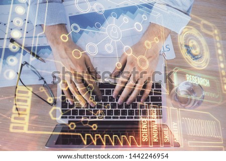 Businessman with computer background with technology theme hologram. Concept of big data. Double exposure.