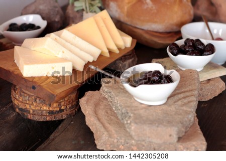 breakfast ingredients on the table. 
 olives,cheese,honey Royalty-Free Stock Photo #1442305208