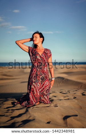 Young woman enjoying her time off on hot summer holidays, Gran Canaria, Spain. 