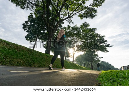 public park in the morning with a ray light in indonesia