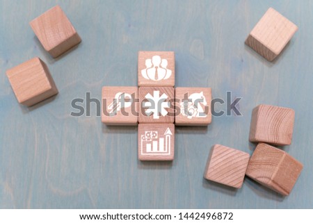 Asterisk business education сoncept on wooden blocks background.