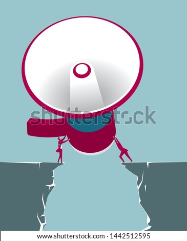 Two businessmen hold up the megaphone. Isolated on blue background.