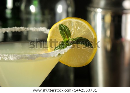 Margarita cocktail, Alcoholic drink, margarita cocktail with lemon and mint and salt on a wooden table. bar. bar stock and accessories. close-up