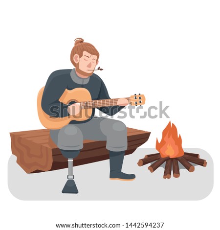 Man with prosthetic leg playing guitar on outdoor camp