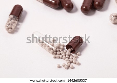 Capsule pills on white background
