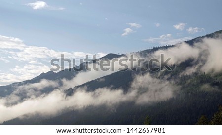 sunrise in the mountains with fog 