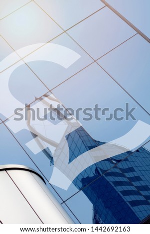Modern office building with sign pound on a background with pound