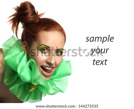 red-haired, green-eyed girl with artistic make-up