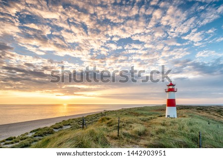 Red Lighthouse on the island of Sylt in North Frisia, Schleswig-Holstein, Germany Royalty-Free Stock Photo #1442903951